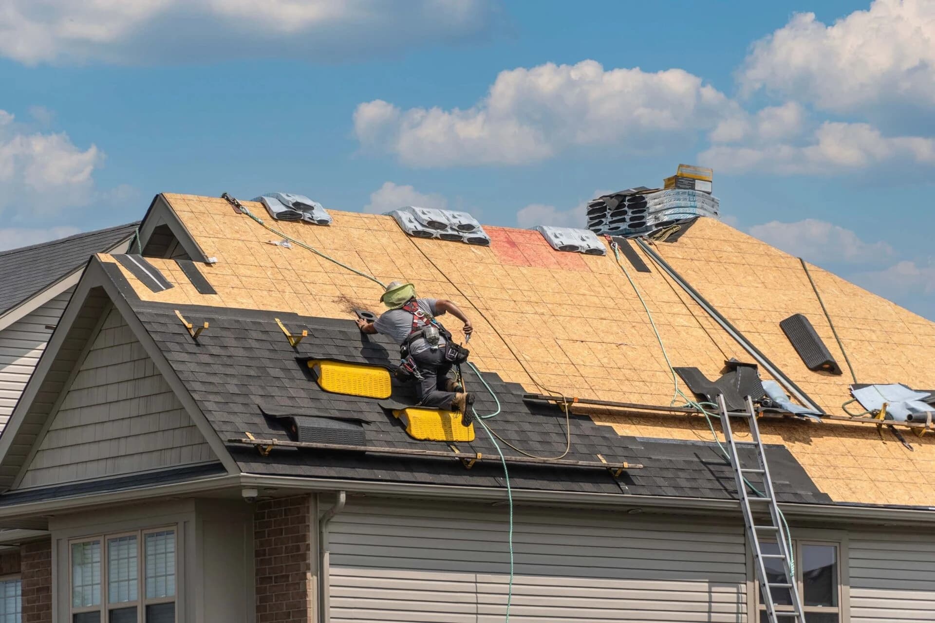 Faith Guard Roofing crew installing a new roof in Atlanta, GA